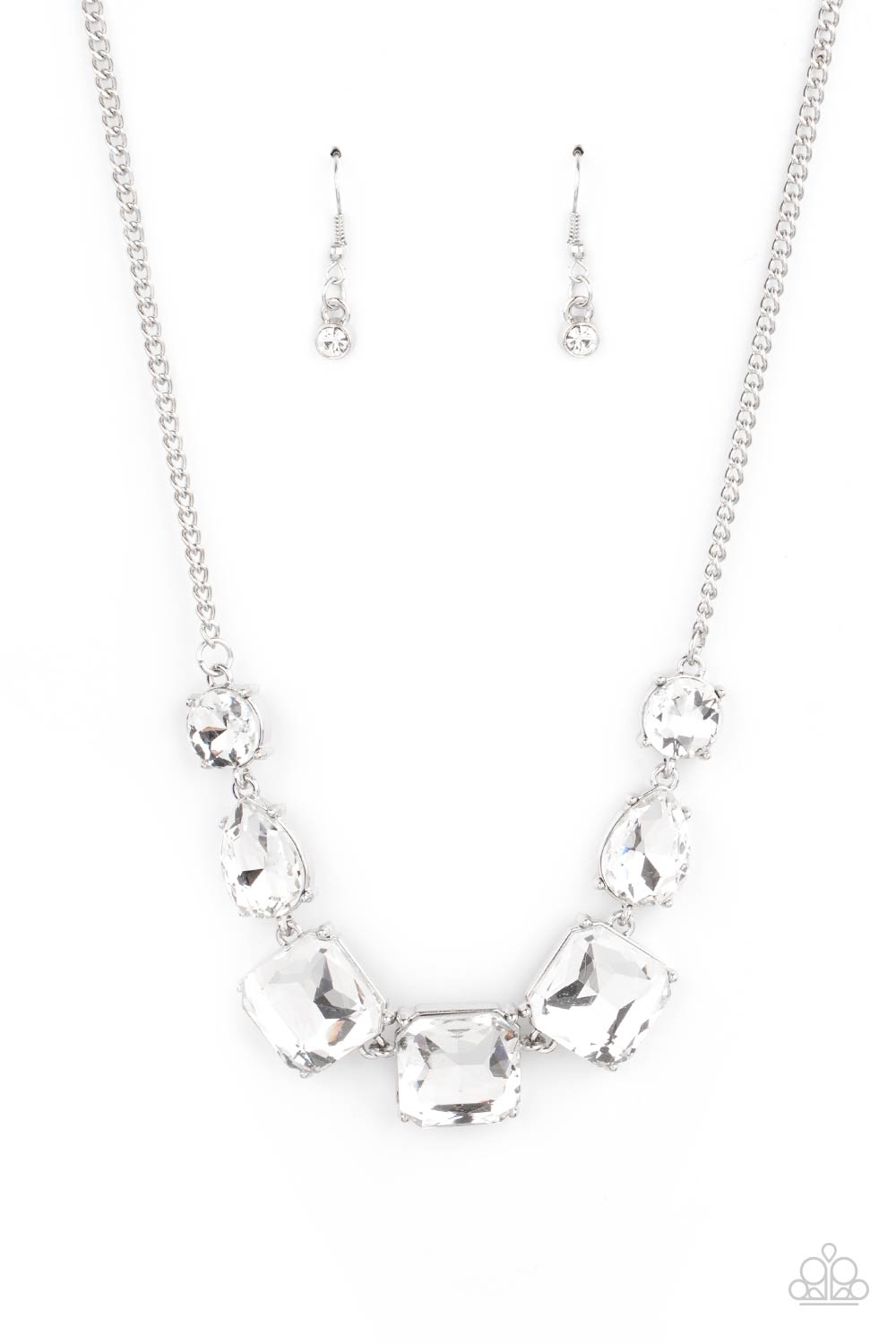 Unfiltered Confidence White Necklace - Paparazzi Accessories  A trio of brilliant white square gut gems encased in classic silver fittings takes center stage. Teardrop and round gems link to a silver chain on either side of the trio for a striking display below the collar. Features an adjustable clasp closure.  All Paparazzi Accessories are lead free and nickel free!  Sold as one individual necklace. Includes one pair of matching earrings.
