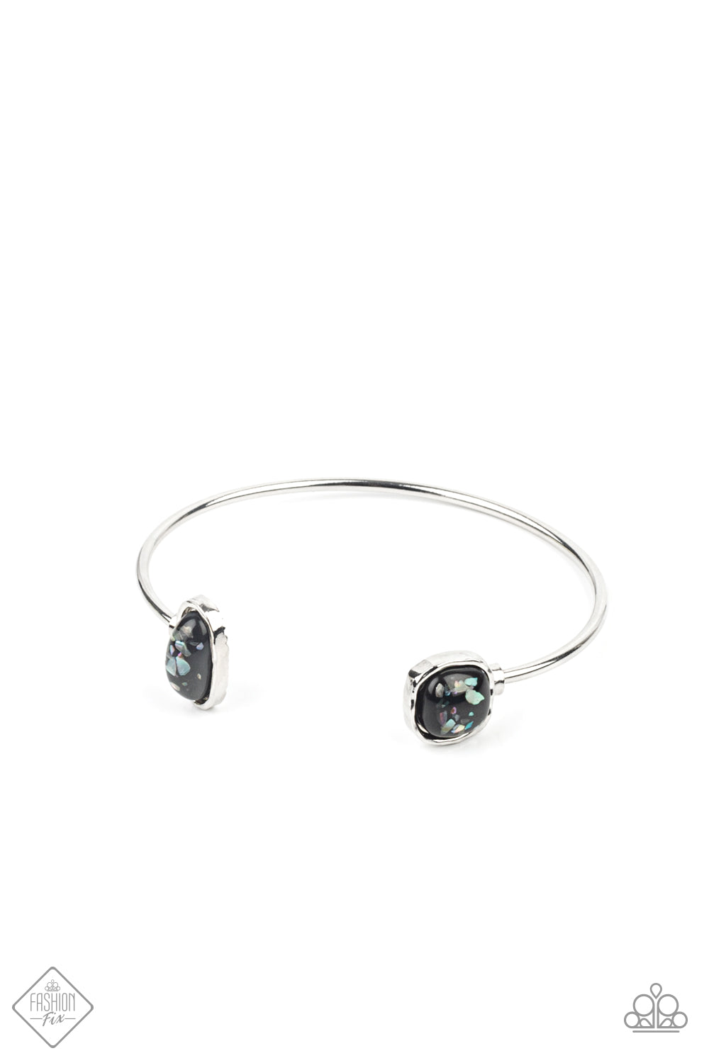 Dont BEAD Jealous Black Bracelet - Paparazzi Accessories.  Flecks of iridescent shell-like pieces are encased inside two mismatched glassy black beads at both ends of a dainty silver open-faced cuff. The shimmery beads are encased in imperfectly hammered silver frames, adding a whimsy finish to the bubbly display.  ﻿All Paparazzi Accessories are lead free and nickel free!  Sold as one individual bracelet.