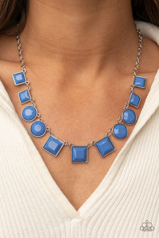 Tic Tac TREND Blue Necklace - Paparazzi Accessories  Bright geometric square and round beads in the Pantone® of French Blue are pressed into simple silver frames to create a lively statement below the collar. Features an adjustable clasp closure.  All Paparazzi Accessories are lead free and nickel free!  Sold as one individual necklace. Includes one pair of matching earrings.