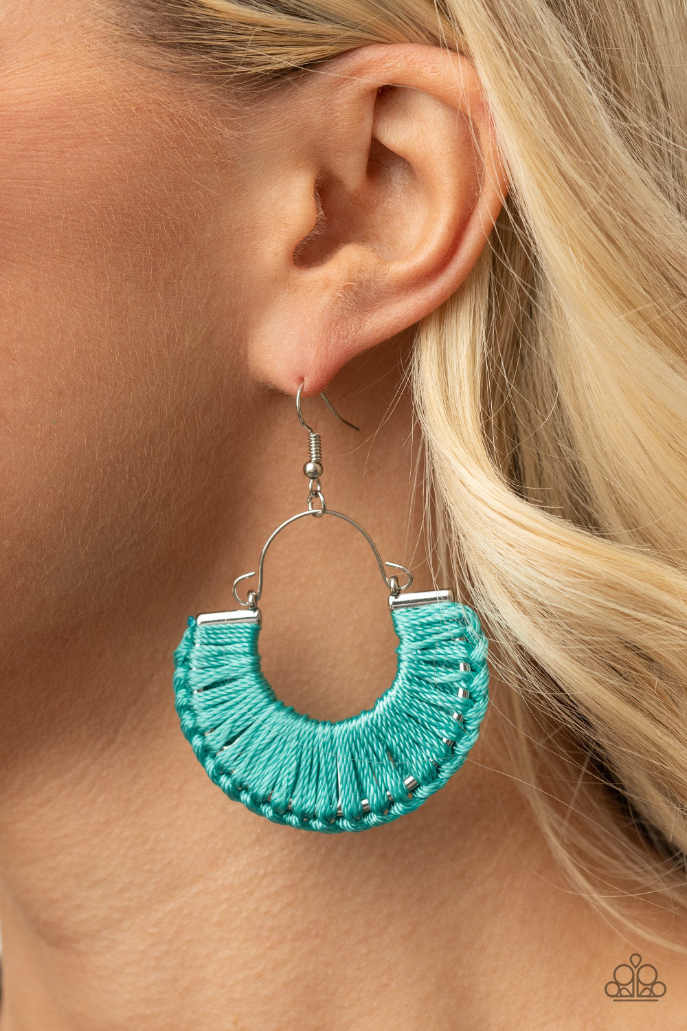 Threadbare Beauty Blue Earring - Paparazzi Accessories.  Shiny Blue Tint thread wraps and knots around a silver half moon frame, creating a colorful boho frame. Earring attaches to a standard fishhook fitting.  ﻿﻿﻿All Paparazzi Accessories are lead free and nickel free!  Sold as one pair of earrings.