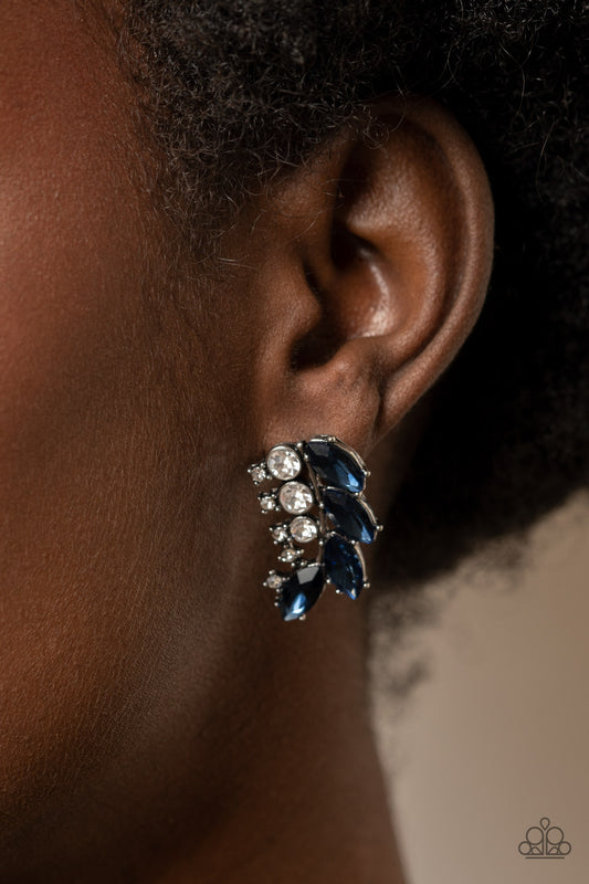 Flawless Fronds Blue Post Earring - Paparazzi Accessories  A frond of dazzling blue marquise and round white rhinestones delicately curves below the ear for a flawless finish. Earring attaches to a standard post fitting.  Sold as one pair of post earrings.