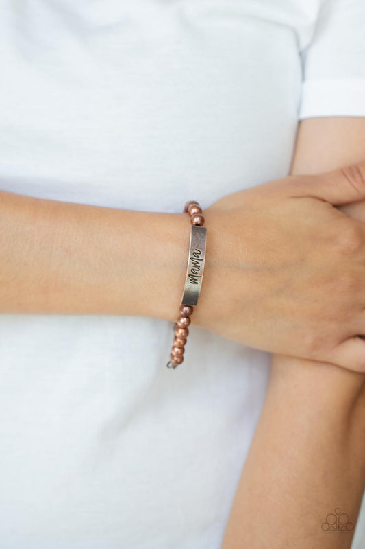 Mom Squad Copper Bracelet - Paparazzi Accessories  Stamped in the word, "Mama," a curved copper plate attaches to strands of copper beads threaded along invisible wire around the wrist, creating a sentimental centerpiece. Features an adjustable clasp closure.  Sold as one individual bracelet.