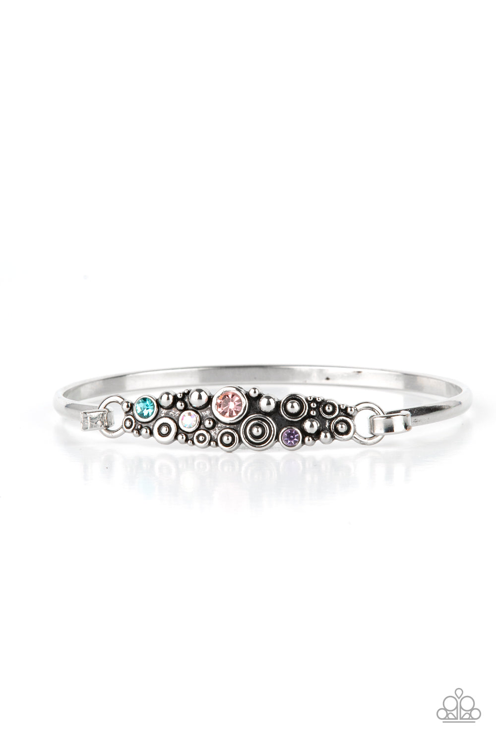 Bubbling Whimsy Multi Cuff Bracelet - Paparazzi Accessories  A cluster of engraved and antiqued silver swirls merge with colorful rhinestones and coalesce into a whimsical display across the wrist on a dainty silver cuff. Features a hook and eye closure.  Sold as one individual bracelet.