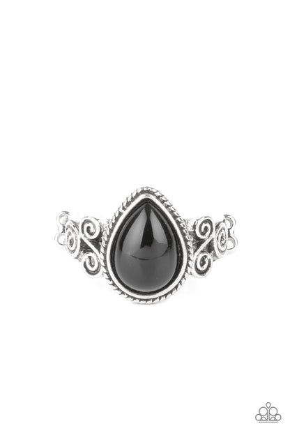 Dreamy Droplets Black Ring - Paparazzi Accessories  A shining black teardrop bead is pressed into a delicately braided silver frame. Featuring silver filigree scrolls, an airy band creates a dreamy backdrop for the centerpiece as it sits atop the finger. Features a dainty stretchy band for a flexible fit.  Sold as one individual ring.