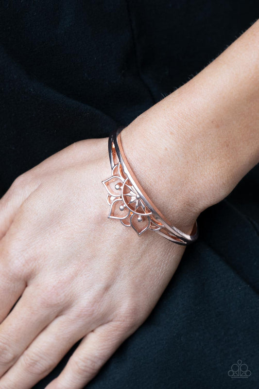 Mandala Mindfulness Rose Gold Cuff Bracelet - Paparazzi Accessories  Brushed in a high sheen finish, an airy mandala-like frame crowns the top of a dainty rose gold cuff for a whimsically seasonal flair.  Sold as one individual bracelet.