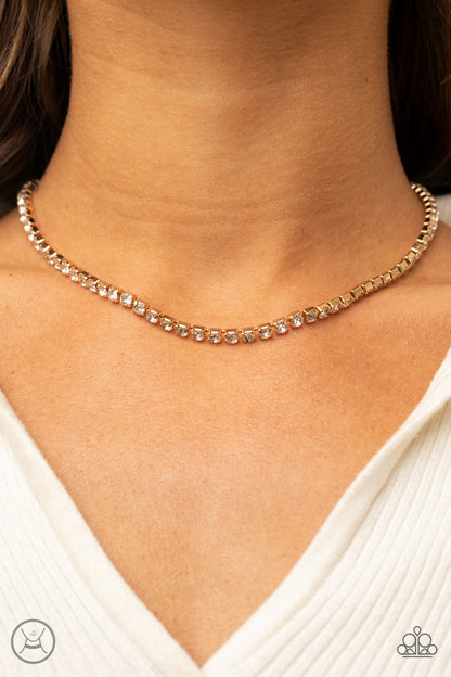Starlight Radiance Gold Choker Necklace - Paparazzi Accessories  A strand of brilliant white rhinestones set in classic gold fittings creates a stunningly radiant display across the collar. Features an adjustable clasp closure.  All Paparazzi Accessories are lead free and nickel free!  Sold as one individual choker necklace. Includes one pair of matching earrings.