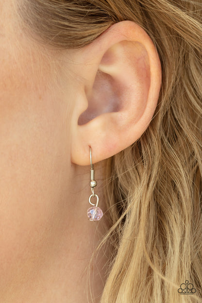 Promoted to Grandma Pink Necklace - Paparazzi Accessories  Infused with a strand of iridescent pink crystal-like beads, two dainty rows of mismatched silver chains delicately layer below the collar. Stamped in the word, "Grandma," a shiny silver disc swings from the lowest chain, creating a loving pendant. Features an adjustable clasp closure.  Sold as one individual necklace. Includes one pair of matching earrings.