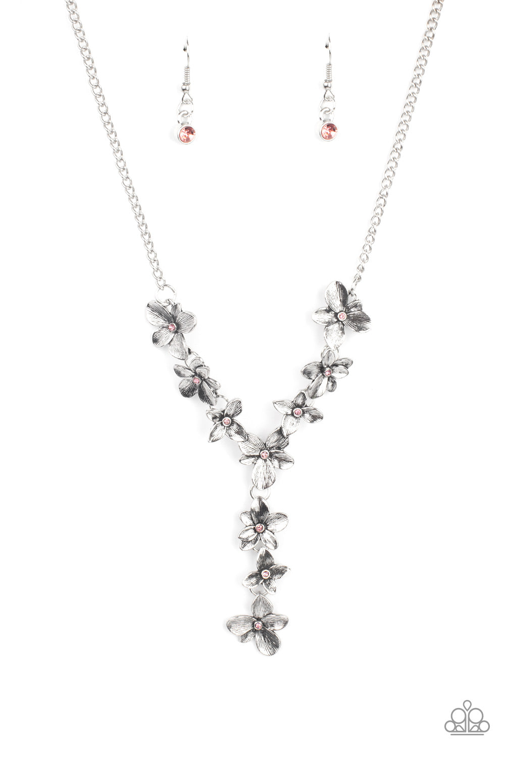 Fairytale Meadow Pink Necklace - Paparazzi Accessories  Dotted with dainty pink rhinestone centers, whimsical silver flowers delicately link into an extended pendant below the collar for an ethereal fashion. Features an adjustable clasp closure.  Sold as one individual necklace. Includes one pair of matching earrings.