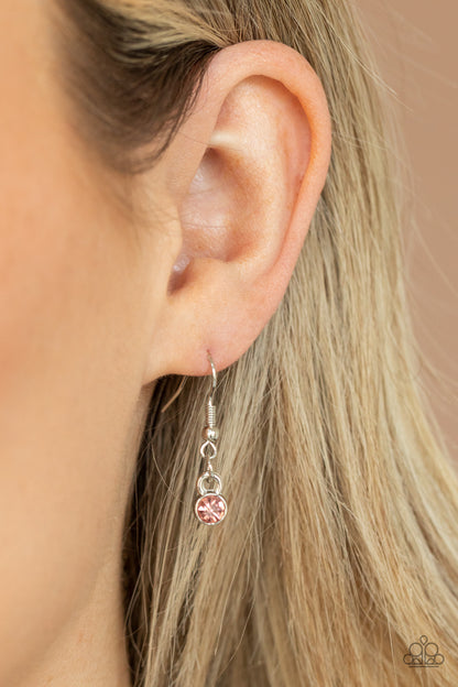Fairytale Meadow Pink Necklace - Paparazzi Accessories  Dotted with dainty pink rhinestone centers, whimsical silver flowers delicately link into an extended pendant below the collar for an ethereal fashion. Features an adjustable clasp closure.  Sold as one individual necklace. Includes one pair of matching earrings.