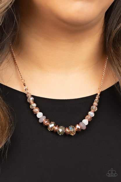 Turn Up The Tea Lights Copper Necklace - Paparazzi Accessories  Varying in opacity, an enchanting collection of iridescent pink, white and champagne colored crystal-like beads are threaded along an invisible wire that is attached to a shiny copper chain below the collar. Mismatched shiny copper beads and ornate shiny copper accents are sprinkled between the glittery compilation, adding a whimsy sheen to the colorful statement piece. Features a clasp closure. Includes one pair of matching earrings.