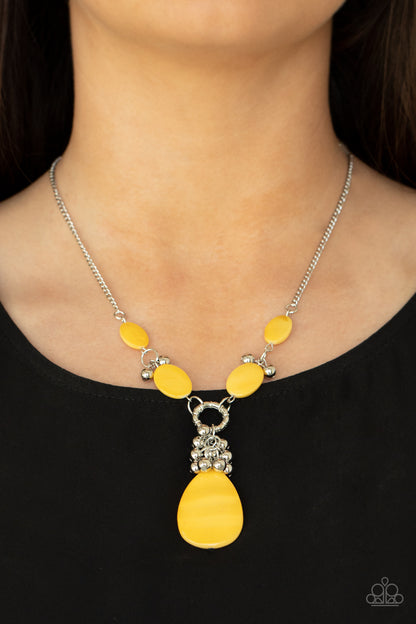 Summer Idol Yellow Necklace - Paparazzi Accessories  Oval Illuminating shell-like beads link with pairs of dainty silver beads below the collar. A cluster of shiny silver beads and an oversized Illuminating shell-like teardrop swings from the bottom, creating a vibrant summer inspired pendant. Features an adjustable clasp closure.  Sold as one individual necklace. Includes one pair of matching earrings.
