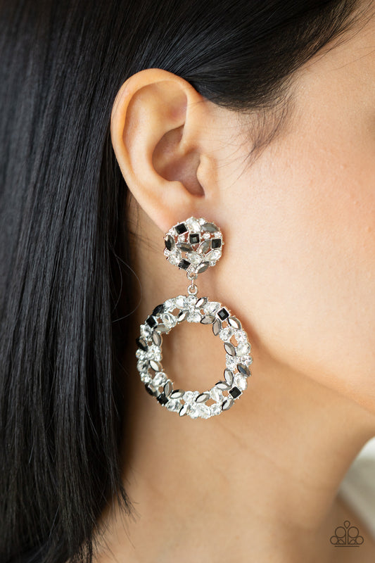 Party Ensemble Black Post Earring - Paparazzi Accessories  A sparkly wreath of marquise cut hematite, black square, white teardrop, and classic white rhinestones delicately swing from the bottom of a matching round frame, creating a dramatically dazzling statement piece. Earring attaches to a standard post fitting.  Sold as one pair of post earrings.