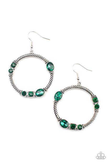 Glamorous Garland Green Earring - Paparazzi Accessories  Featuring round, oval, and square cuts, a collection of glittery green rhinestones haphazardly adorn the front of a textured silver hoop, for a gritty-glamorous look. Earring attaches to standard fishhook fittings.  All Paparazzi Accessories are lead free and nickel free!  Sold as one pair of earrings.