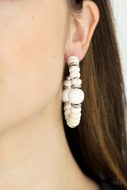 Definitely Down-To-Earth White Hoop Earring - Paparazzi Accessories  An earthy collection of white stone beads, silver discs, and white wooden beads are delicately threaded along a dainty wire, creating an artisan inspired hoop. Earring attaches to a standard post fitting. Hoop measures approximately 2" in diameter.  Sold as one pair of hoop earrings.