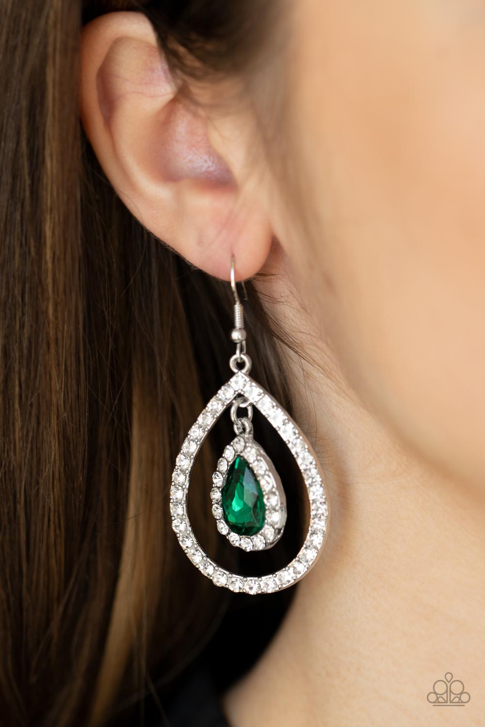 Blushing Bride - Green Item #P5RE-GRXX-154XX A brilliant green teardrop gem, encased in a sparkling white rhinestone frame, creates a striking pendant as it dangles inside an airy teardrop frame encrusted with white rhinestones and culminates into a mesmerizing lure. Earring attaches to a standard fishhook fitting.  Sold as one pair of earrings.
