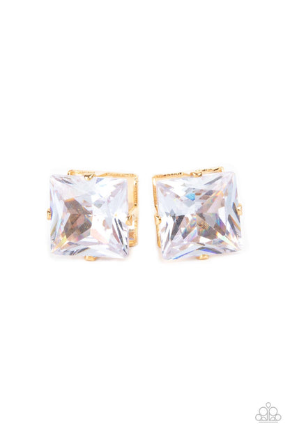 Times Square Timeless Gold Earring - Paparazzi Accessories  A stunning oversized square rhinestone, set in a classic gold pronged fitting, makes a show-stopping impact as it shines brilliantly and draws attention up to the face. Earring attaches to a standard post fitting.  Sold as one pair of post earrings.