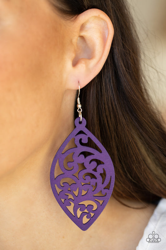 Coral Garden Purple Wooden Earring - Paparazzi Accessories  Painted in a vibrant purple finish, a floral motif permeates an airy oval wooden frame creating a tropical-inspired lure. Earring attaches to a standard fishhook fitting.  All Paparazzi Accessories are lead free and nickel free!  Sold as one pair of earrings.