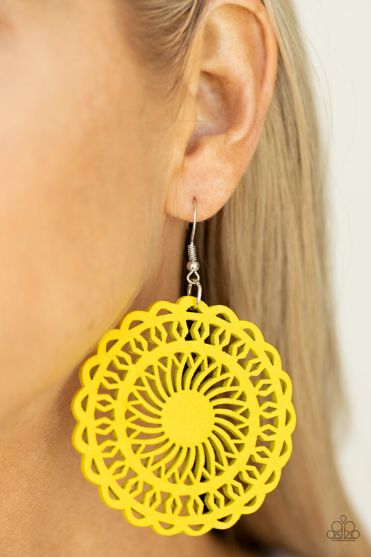 Island Sun Yellow Wooden Earring - Paparazzi Accessories  Painted in a sunny yellow finish, a stenciled wooden frame is cutout into a radiating sunburst frame for a colorfully tropic look. Earring attaches to a standard fishhook fitting.  All Paparazzi Accessories are lead free and nickel free!   Sold as one pair of earrings.