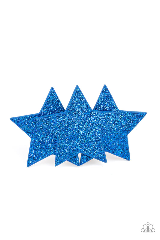 Happy Birthday America Blue Hair Clip - Paparazzi Accessories  Dusted in glittery sparkles, dazzling blue leather stars delicately overlap into a stellar centerpiece for a sparkly patriotic finish. Features a standard hair clip on the back.  Sold as one individual hair clip.