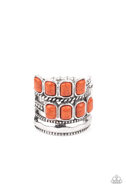 Mojave Monument Orange Ring - Paparazzi Accessories   Mismatched rows of Adobe rectangular stone beads, twisted silver and studded silver bars, and a faceted silver band haphazardly layer across the finger, coalescing into a colorfully rustic centerpiece. Features a stretchy band for a flexible fit.  ﻿All Paparazzi Accessories are lead free and nickel free!  Sold as one individual ring.