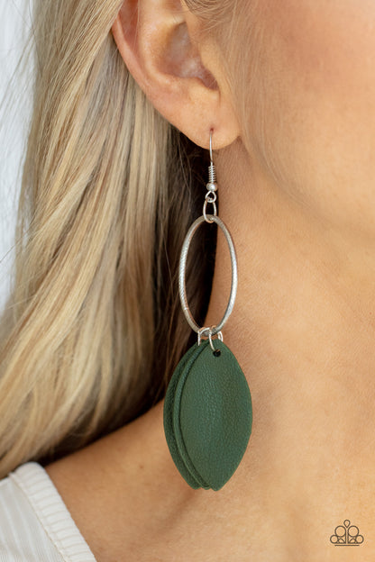 Leafy Laguna Green Earring - Paparazzi Accessories  Leafy green leather frames swing from the bottom of a textured silver hoop, creating an earthy fringe. Earring attaches to a standard fishhook fitting.  All Paparazzi Accessories are lead free and nickel free!  Sold as one pair of earrings.