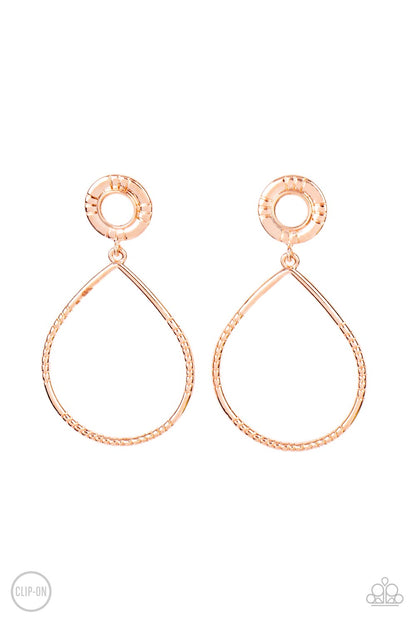 Fairytale Finish Copper Clip-On Earring - Paparazzi Accessories  A milky white bead is pressed into the center of a textured shiny copper fitting that attaches to an oversized textured shiny copper teardrop, creating an ethereal lure. Earring attaches to a standard clip-on earring.  Sold as one pair of clip-on earrings.
