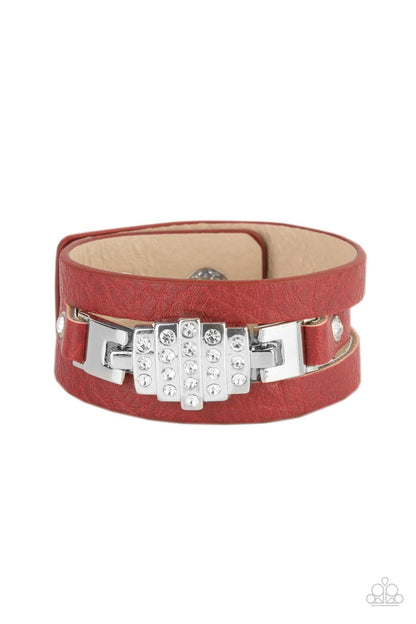 Ultra Urban Red Wrap Bracelet - Paparazzi Accessories  A white rhinestone silver centerpiece is studded in place by white rhinestone encrusted silver studs across the spliced center of a red leather band, creating a glittery urban look around the wrist. Features an adjustable snap closure.  Sold as one individual bracelet.