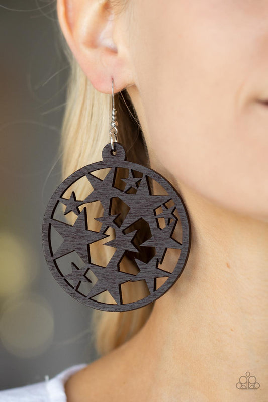 Cosmic Paradise Brown Wooden Earring - Paparazzi Accessories  An oversized round brown wooden frame is filled with a cosmos of cut-out brown stars creating a whimsical statement. Earring attaches to a standard fishhook fitting.  Sold as one pair of earrings.
