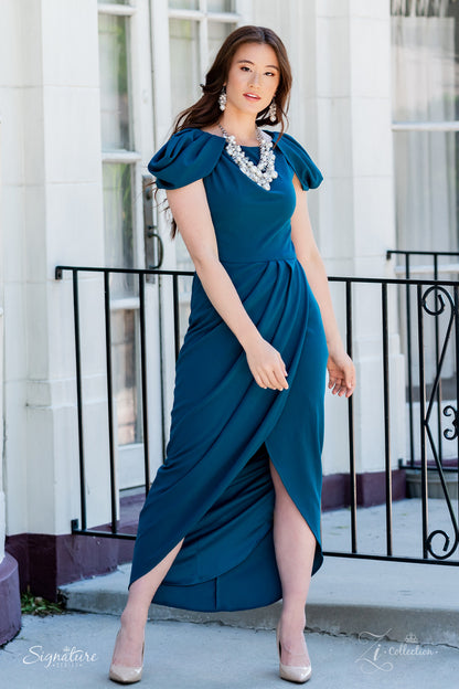 An elegantly effervescent collection of oversized pearls, glassy crystal-like beads, and white rhinestone studded silver ornaments effortlessly clusters along two bold silver chains below the collar. The bubbly bunched accents glamorously gather into a brilliantly boisterous fringe for an uproarious uptown fashion. Features an adjustable clasp closure.  All Paparazzi Accessories are lead free and nickel free!