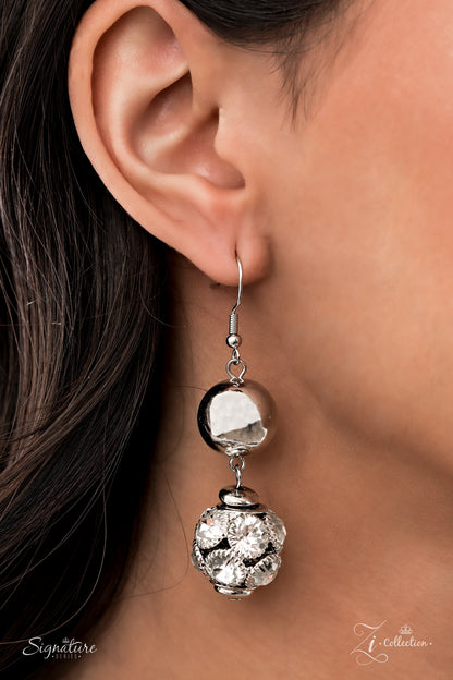 Held together by rectangular silver frames, a couture-clutching collection of oversized silver beads interspersed with white rhinestone encrusted ornaments alternates with interlocking rows of white rhinestone encrusted chains across the chest. Edgily enhanced with linked rows of silver chain fittings, the emboldened silver layers demand to be seen with their unapologetic attitude. Features an adjustable clasp closure.  All Paparazzi Accessories are lead free and nickel free!