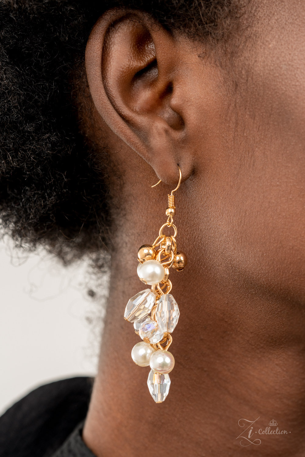 Sentimental 2021 Zi Collection Necklace - Paparazzi Accessories  Mesmerizingly mismatched crystal-like beads, white pearls, and classic white rhinestones delicately attach to a golden chain net below the collar. Jampacked with noise-making shimmer, the effervescently clustered fringe dances with each movement for an elegantly bubbly finish. Features an adjustable clasp closure.  Sold as one individual necklace. Includes one pair of matching earrings.