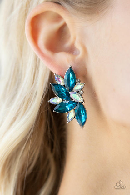 Instant Iridescence Blue Earring - Paparazzi Accessories  Infused with dainty white rhinestones, a stellar display of blue and iridescent marquise cut rhinestones fan out into a spectacular centerpiece. Earring attaches to a standard post fitting.  Sold as one pair of post earrings.