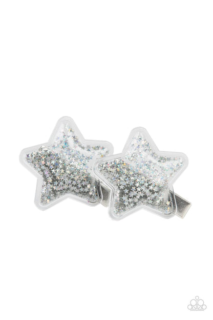 Stellar-ista Silver Hair Clip - Paparazzi Accessories  Sparkly silver star sequins are encased inside air filled plastic-like star frames, creating a stellar pair. Features standard hair clips on the back.  All Paparazzi Accessories are lead free and nickel free!  Sold as one pair of hair clips.