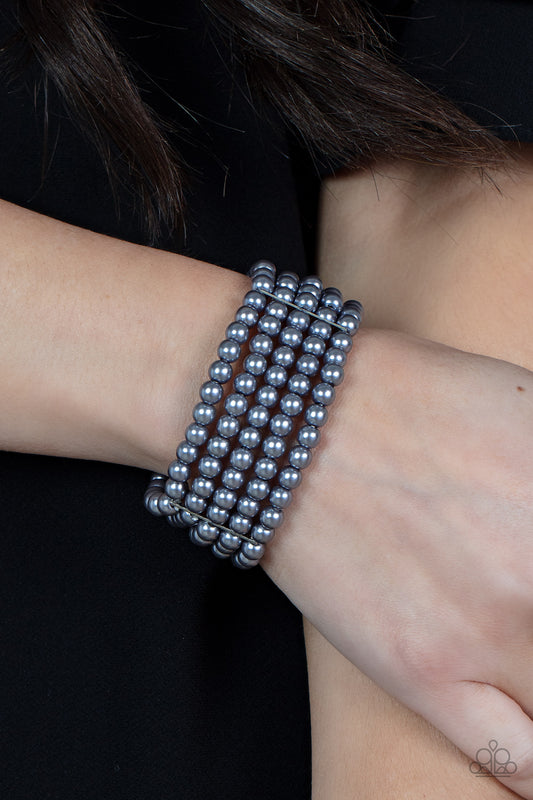 A Pearly Affair Silver Bracelet - Paparazzi Accessories  Stacked layers of luminous grey pearl-like beads are threaded along stretchy bands creating a subtly indulgent allure around the wrist.  All Paparazzi Accessories are lead free and nickel free!  Sold as one individual bracelet.