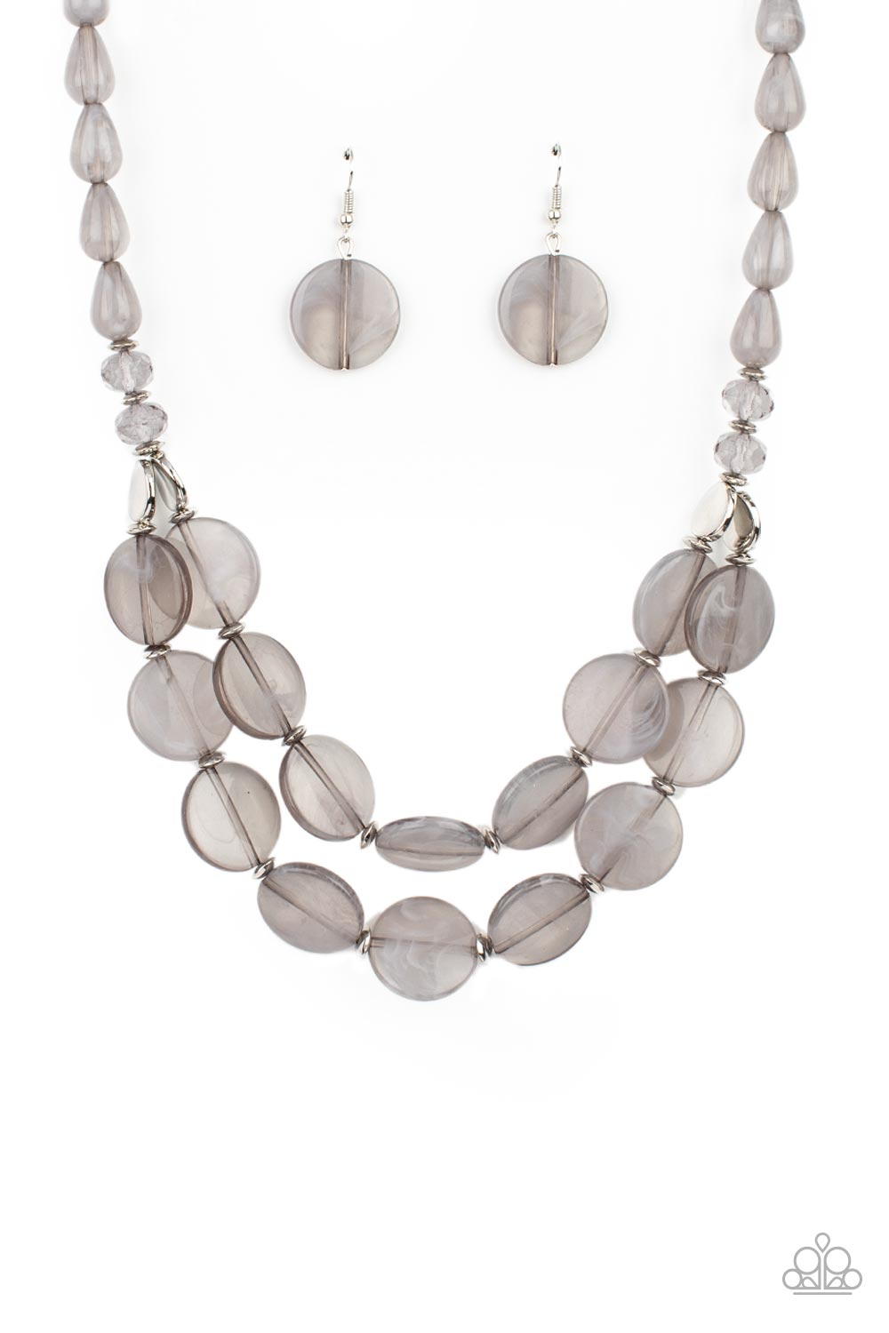 Beach Day Demure Silver Necklace - Paparazzi Accessories  Intermixed with smoky crystal-like beads and shiny silver accents, mismatched cloudy, glassy, and opaque gray teardrop and disc beads layer below the collar for a classic pop of neutral color. Features an adjustable clasp closure.  Sold as one individual necklace. Includes one pair of matching earrings.
