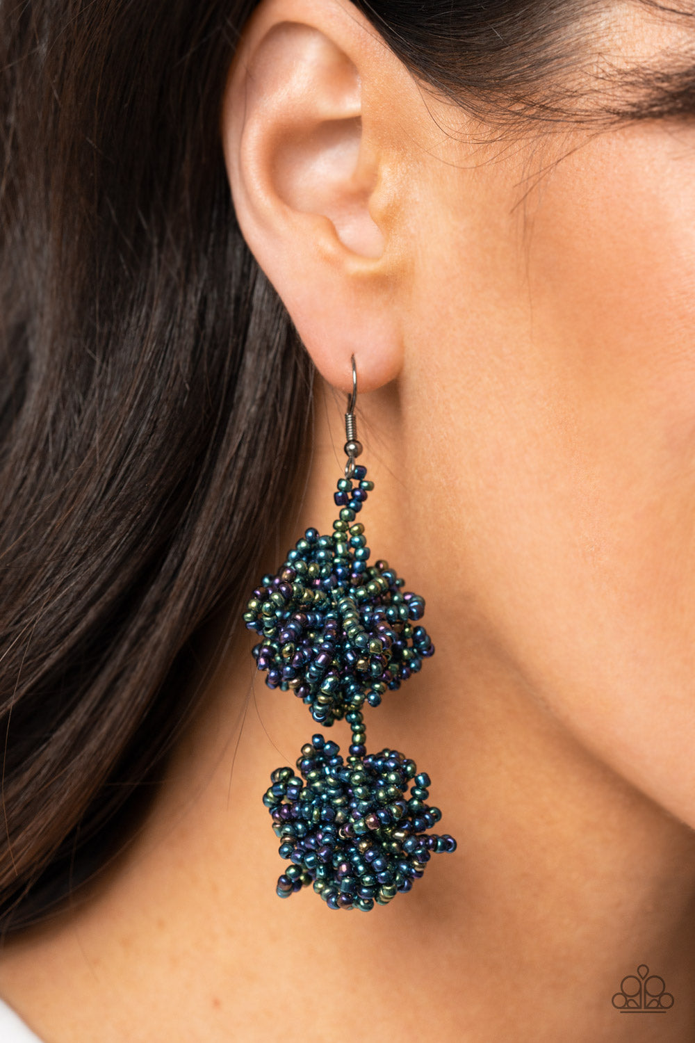 Celestial Collision Multi Earring - Paparazzi Accessories  Strands of oil spill seed beads delicately knot into an elegantly clustered lure, creating a stellar modern look. Earring attaches to a standard fishhook fitting.  Sold as one pair of earrings.