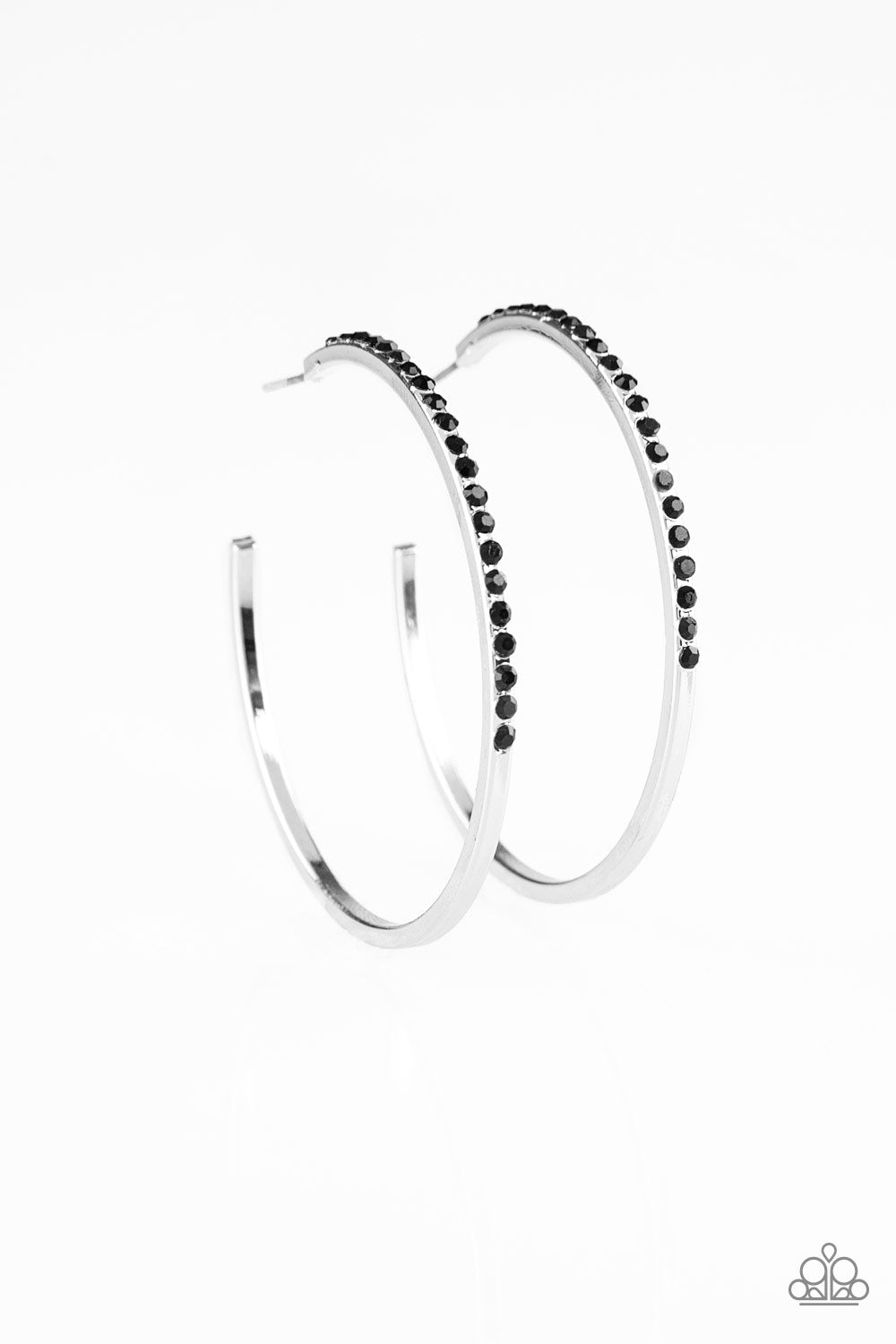 Chic Classic - Black Item #E350 The front of a silver hoop is encrusted in glittery black rhinestones for a glamorous look. Earring attaches to a standard post fitting. Hoop measures 2" in diameter. All Paparazzi Accessories are lead free and nickel free!  Sold as one pair of hoop earrings.