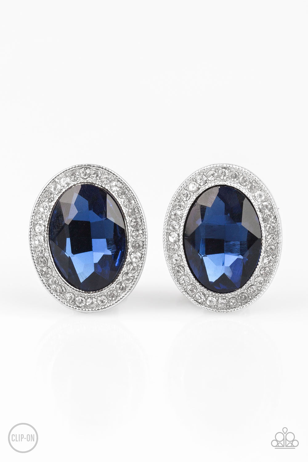 Only FAME In Town - Blue Item #E460 An oversized blue gem is pressed into the center of a silver frame radiating with glassy white rhinestones for a glamorous look. Earring attaches to a standard clip-on fitting. All Paparazzi Accessories are lead free and nickel free!  Sold as one pair of clip-on earrings.