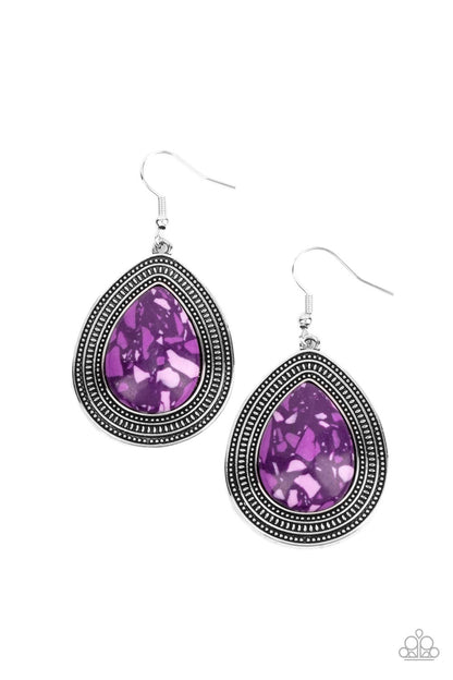 Terrazzo Tundra Purple Earring - Paparazzi Accessories  Featuring a colorful terrazzo pattern, a purple teardrop stone is pressed into the center of a silver frame studded and embossed in borders of tribal inspired textures. Earring attaches to a standard fishhook fitting.  Sold as one pair of earrings.