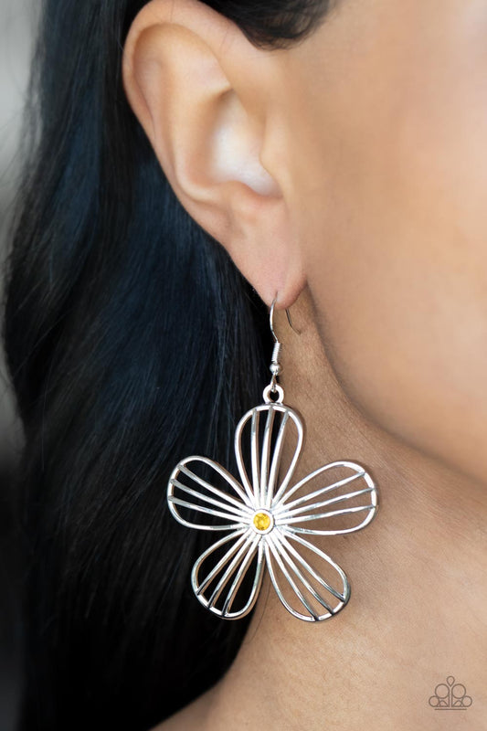 Meadow Musical Yellow Earring - Paparazzi Accessories  Dotted with a dainty yellow rhinestone, airy silver petals streaked with linear bars bloom into an enchanting floral frame. Earring attaches to a standard fishhook fitting.  Sold as one pair of earrings.