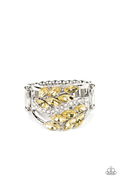 Luminously Leafy Yellow Ring - Paparazzi Accessories Item #P4RE-YWXX-076XX Clusters of yellow marquise-cut crystals flank a wavy band of dainty white rhinestones atop the finger. The yellow crystals fall into a leafy pattern, adding a touch of earthy elegance to the luminously layered look. Features a stretchy band for a flexible fit.  Sold as one individual ring.