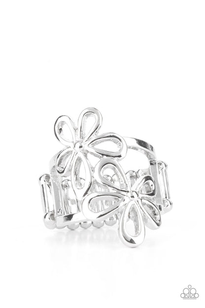 Perennial Pair Silver Ring - Paparazzi Accessories  A pair of silver flowers bloom atop two silver bands, creating a simply seasonal centerpiece atop the finger. Features a stretchy band for a flexible fit.  Sold as one individual ring.