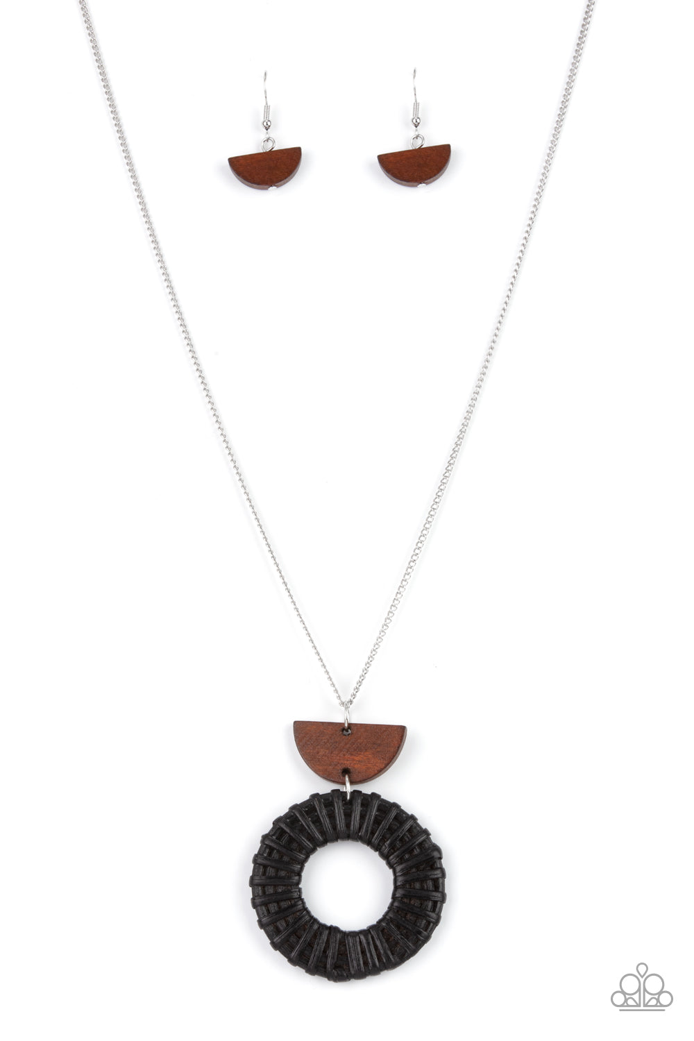 Homespun Stylist Black Necklace - Paparazzi Accessories  Black wicker-like cording wraps into a rustic hoop at the bottom of a half moon wooden frame. The earthy stacked pendants swing from a lengthened silver chain, creating an artisan inspired display. Features an adjustable clasp closure.  Sold as one individual necklace. Includes one pair of matching earrings.
