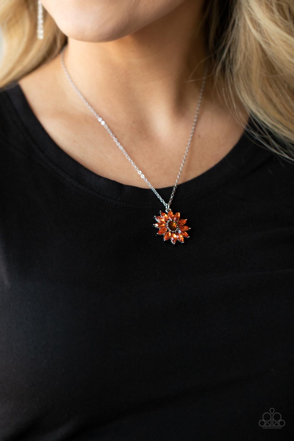 Formal Florals Orange Necklace - Paparazzi Accessories  Glittery orange marquise cut rhinestones fan out from an oval topaz rhinestone center, creating a fabulous floral pendant at the bottom of a dainty silver chain. Features an adjustable clasp closure.  Sold as one individual necklace. Includes one pair of matching earrings.