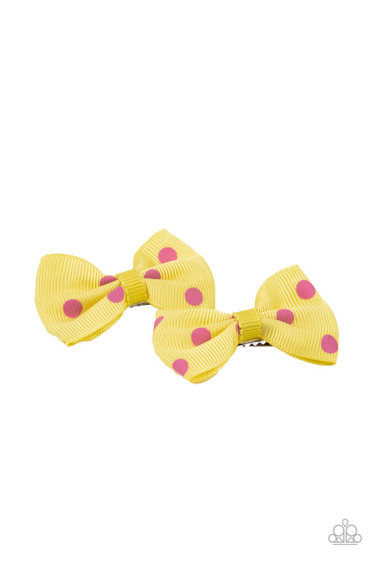 Polka Dot Drama Yellow Hair Clip - Paparazzi Accessories  Featuring flirty pink polka dots, a dainty pair of yellow ribbon bows pull back the hair for a playful fashion. Features standard hair clips on the back.  Sold as one pair of hair clips.