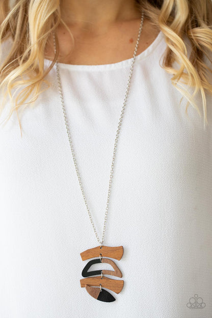 A WOODWORK In Progress Black Necklace - Paparazzi Accessories  Featuring black acrylic accents, mismatched wooden frames delicately link into a abstract pendant at the bottom of a lengthened silver chain for an earthy fashion. Features an adjustable clasp closure.  Sold as one individual necklace. Includes one pair of matching earrings.