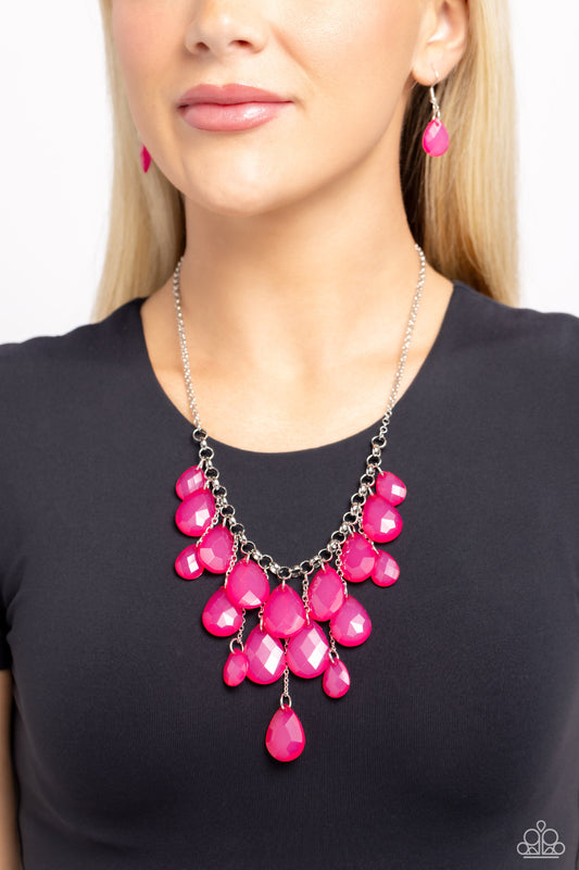 Front Row Flamboyance Pink Necklace - Paparazzi Accessories  Varying in size, an opaque collection of faceted pink teardrops trickle along a chunky silver chain. Infused with dainty silver chains, additional teardrop beads swing from the effervescent fringe at varying lengths for a glamorous finish. Features an adjustable clasp closure.  Sold as one individual necklace. Includes one pair of matching earrings.  P2ST-PKXX-108XX