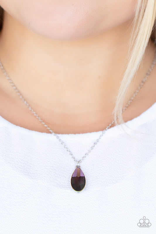 Prismatically Polished Purple Necklace - Paparazzi Accessories  Encased in a sleek silver fitting, an elongated purple teardrop gem swings from the bottom of a classic silver chain below the collar for a timeless elegance. Features an adjustable clasp closure.  Sold as one individual necklace. Includes one pair of matching earrings.
