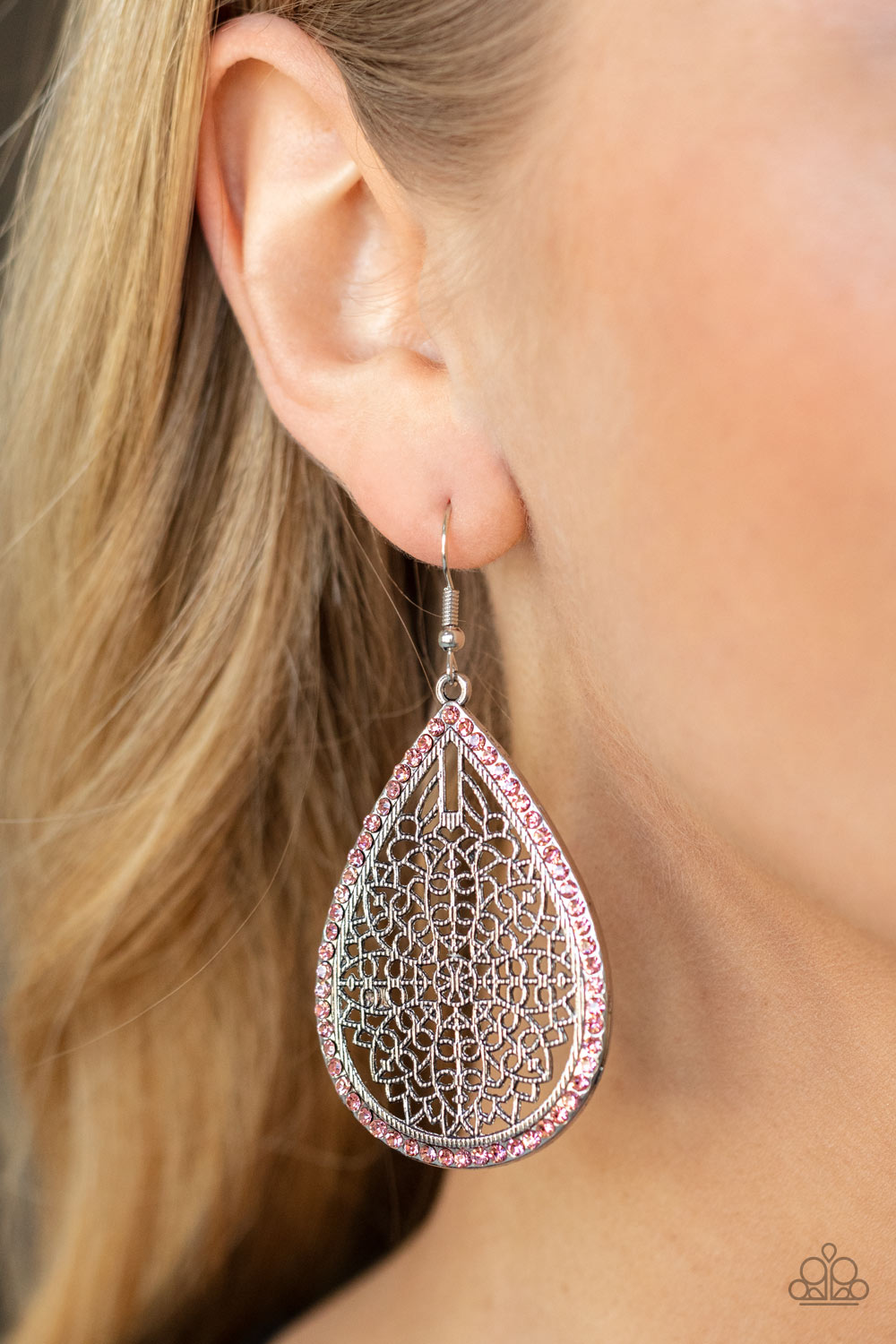 Fleur de Fantasy Pink Earring - Paparazzi Accessories  Bordered in dainty pink rhinestones, the center of an oversized silver teardrop is filled with an airy floral pattern for a seasonal flair. Earring attaches to a standard fishhook fitting.  All Paparazzi Accessories are lead free and nickel free!  Sold as one pair of earrings.