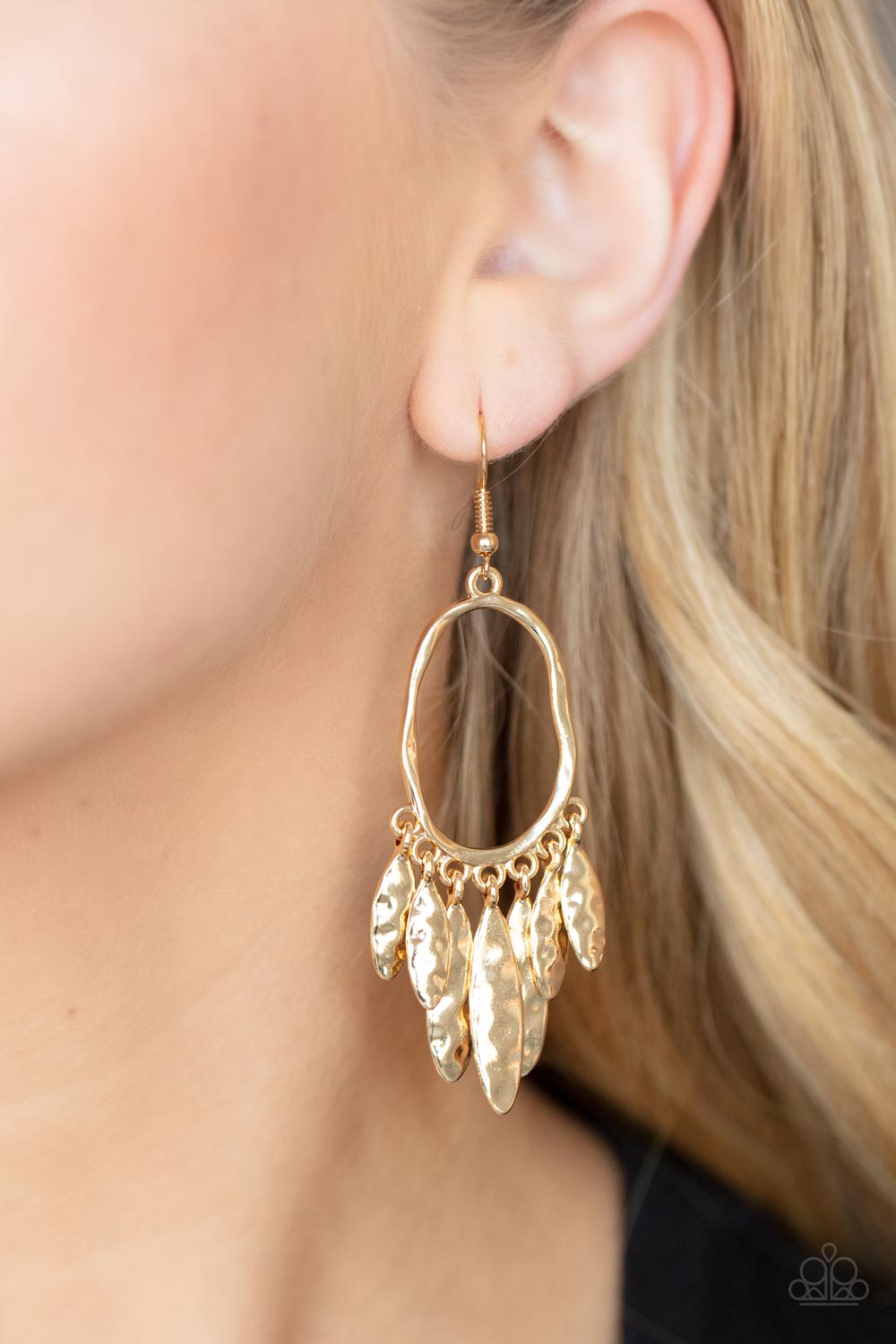 Artisan Aria Gold Earring - Paparazzi Accessories  A tapered fringe of hammered gold oval frames swing from the bottom of a hammered oval hoop, creating a musical fringe. Earring attaches to a standard fishhook fitting.  Sold as one pair of earrings.